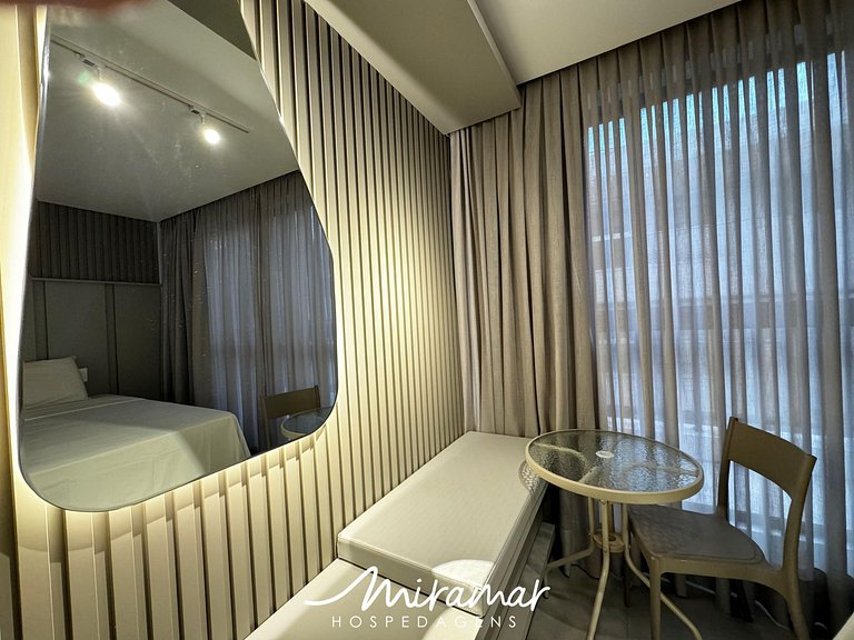 Flat: Aconchego e Elegância a 50m do Mar