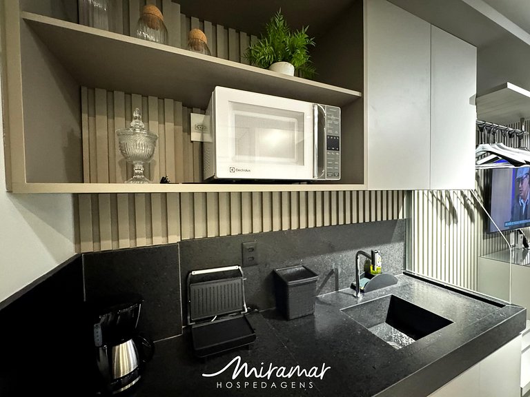 Flat: Aconchego e Elegância a 50m do Mar