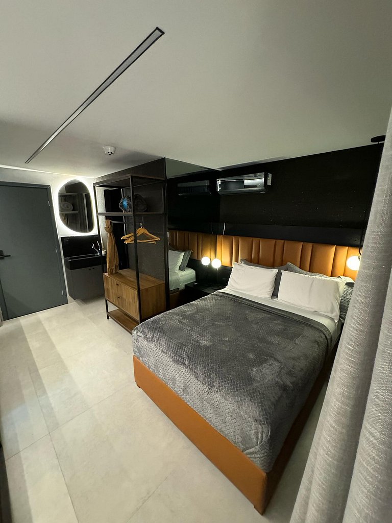 Flat a 50 Metros da praia no Get By Side