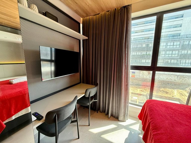 Flat encantador a poucos passos da praia