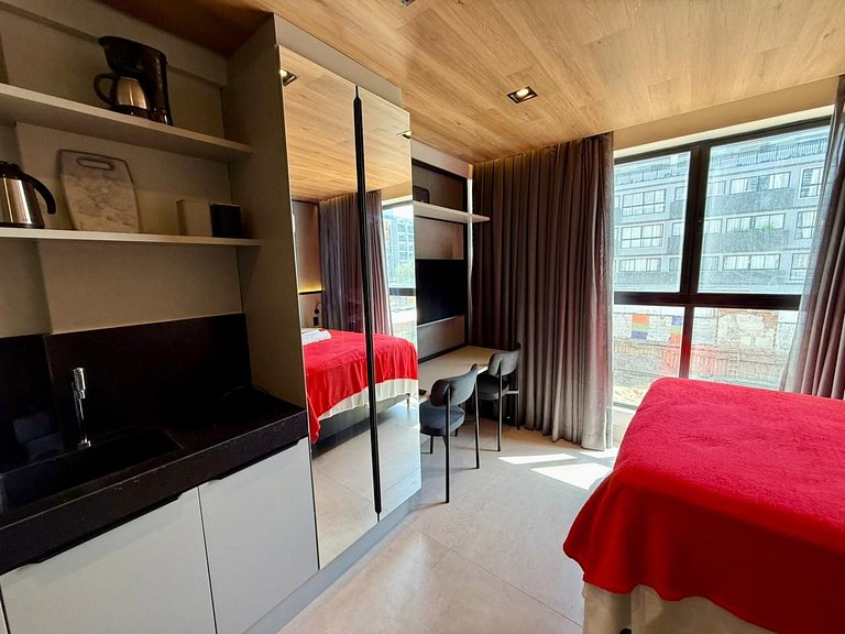 Flat encantador a poucos passos da praia