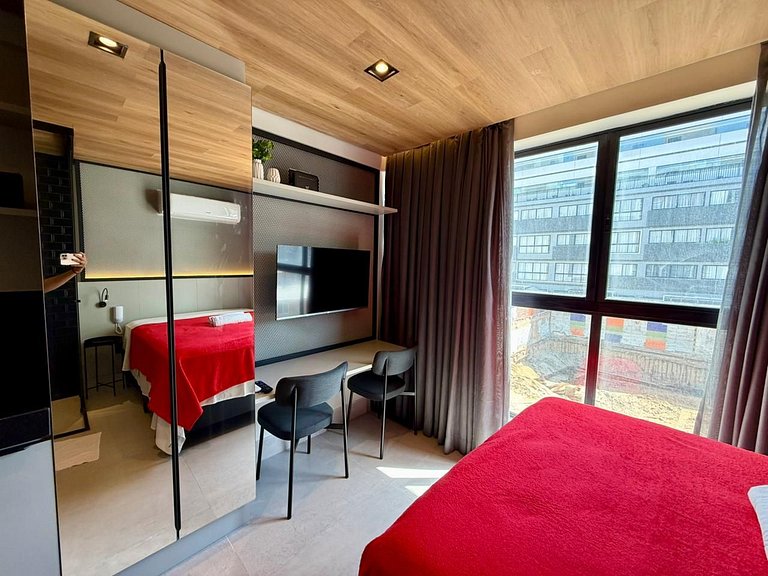 Flat encantador a poucos passos da praia