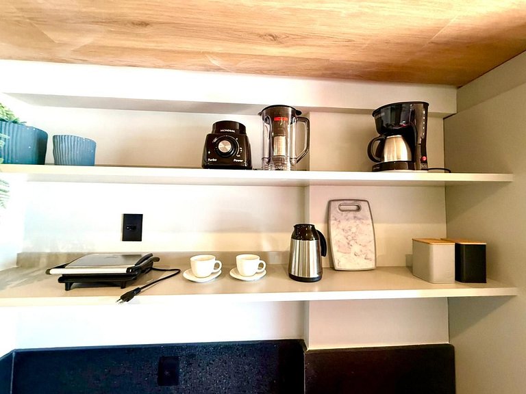 Flat encantador a poucos passos da praia